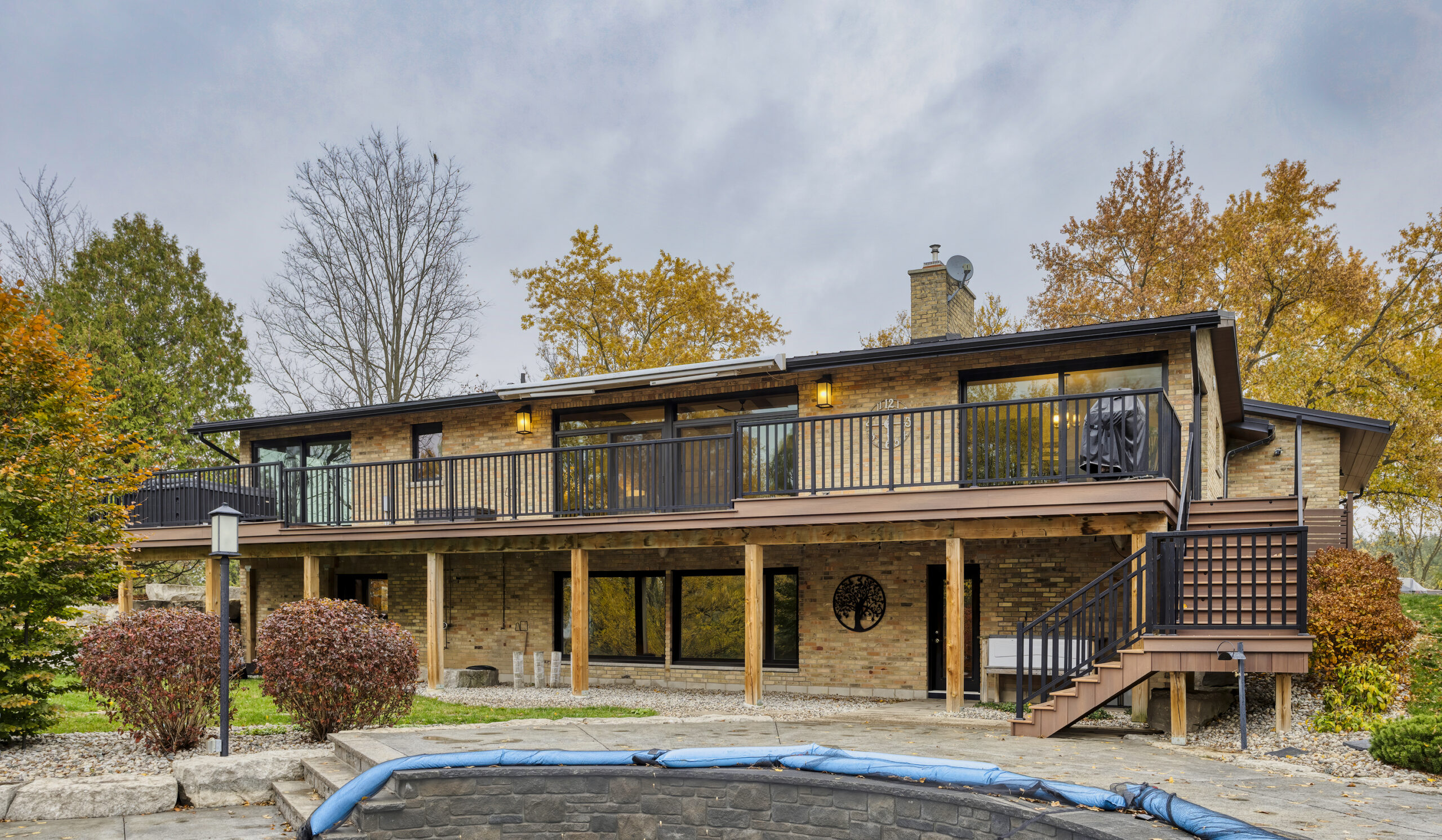 Residential exterior house painting project in London Ontario with high-quality durable finish by GreenTech Painting