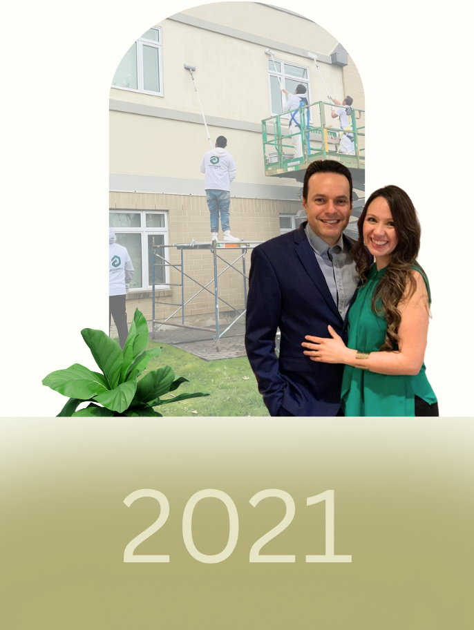 GreenTech Painting founders Yarinka Rojas and Juan Carlos Granados celebrating the company's continued growth in 2021 while leading larger residential and commercial painting projects in London, Ontario.