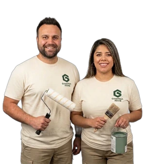 GreenTech Painting professional painting team holding a roller and brush in London, Ontario.