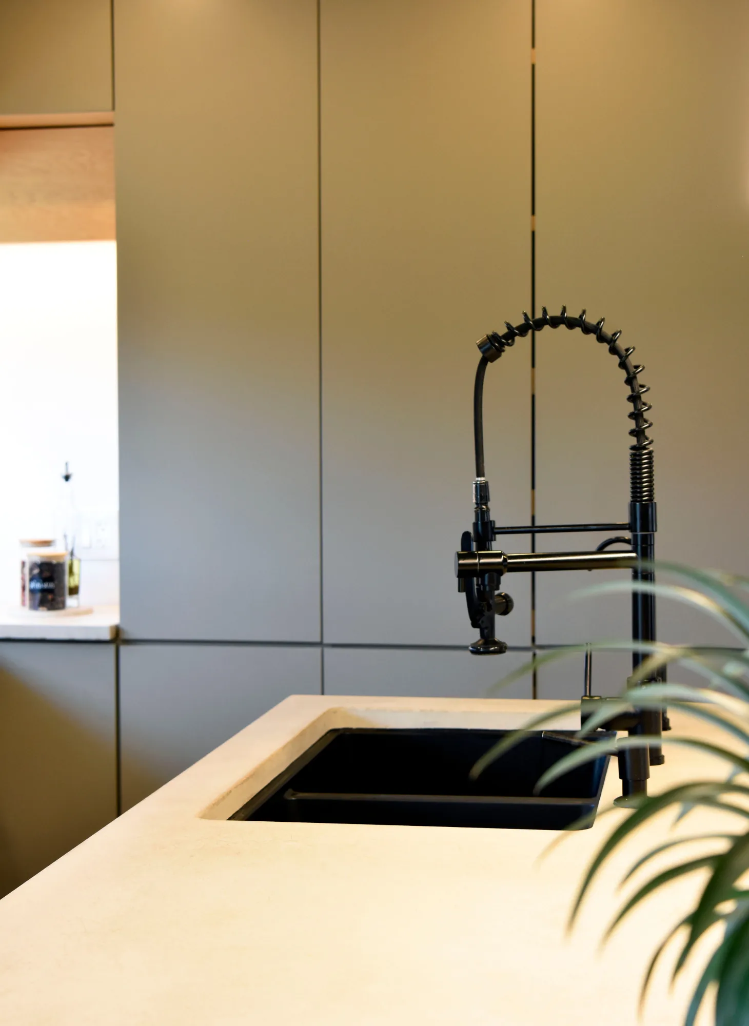Professionally painted modern kitchen cabinets with a premium smooth finish by GreenTech Painting in London, Ontario.